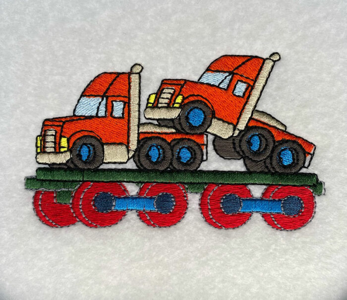 trucks on train car embroidery design