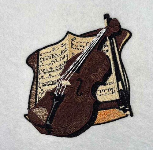 Violin and sheet music embroidery design