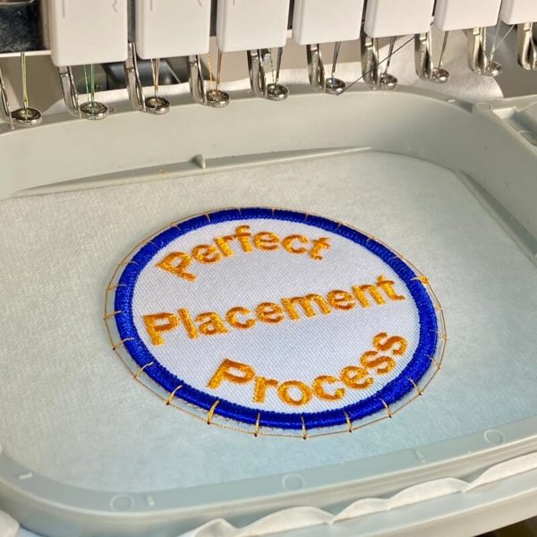 Guaranteed embroidery patch placement process