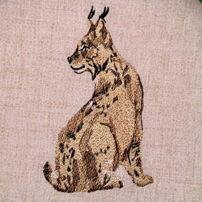 seated lynx embroidery design