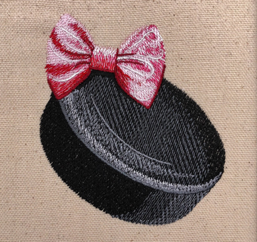 Hockey puck bow embroidery design