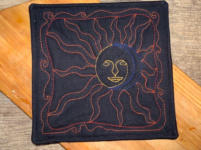 sun quilted potholder