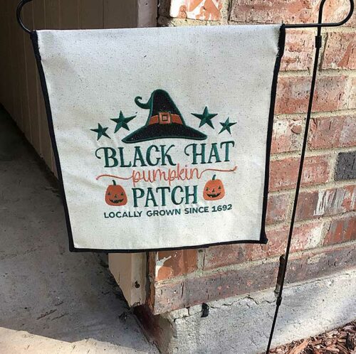 Black Hat Pumpkin sign