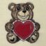 Teddy Holding heart embroidery design