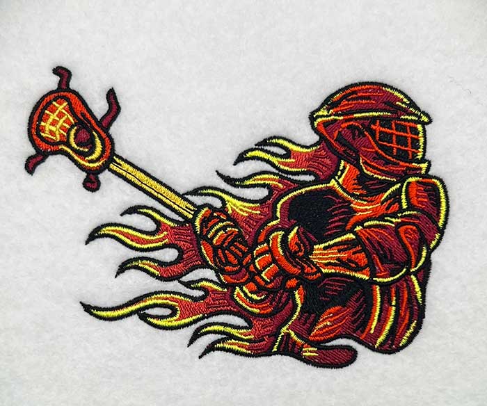 flaming lacrosse player embroidery design